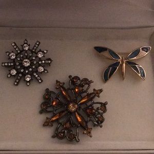 Three Brooches